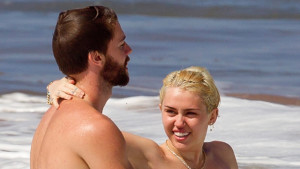 *EXCLUSIVE*  Miley Cyrus goes topless **WEB EMBARGO UNTIL 16:00 PST 01/26/2015** *MUST CALL FOR PRICING*