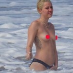 Captan a Miley Cyrus bañándose Topless en Hawai : Fotos y VIDEO (Aquí las imágenes)